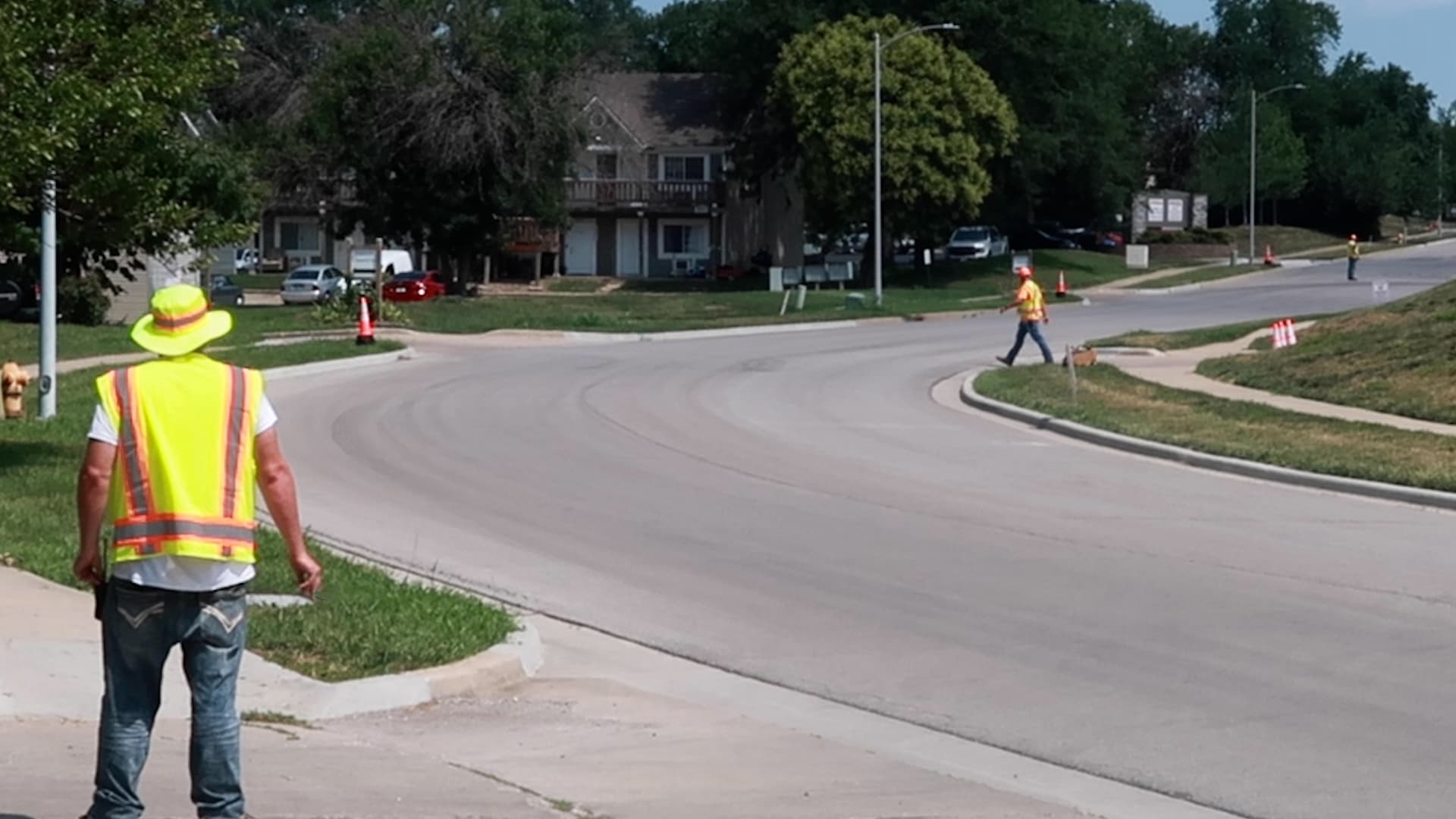 Flaggers Guarding a Roadway